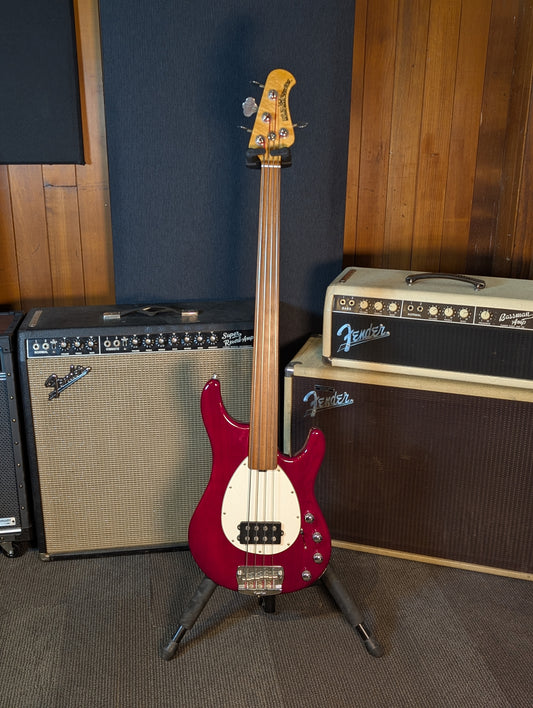 Ernie Ball Music Man Sterling 4-String Fretless Electric Bass Guitar w/Case - Translucent Red (1998)