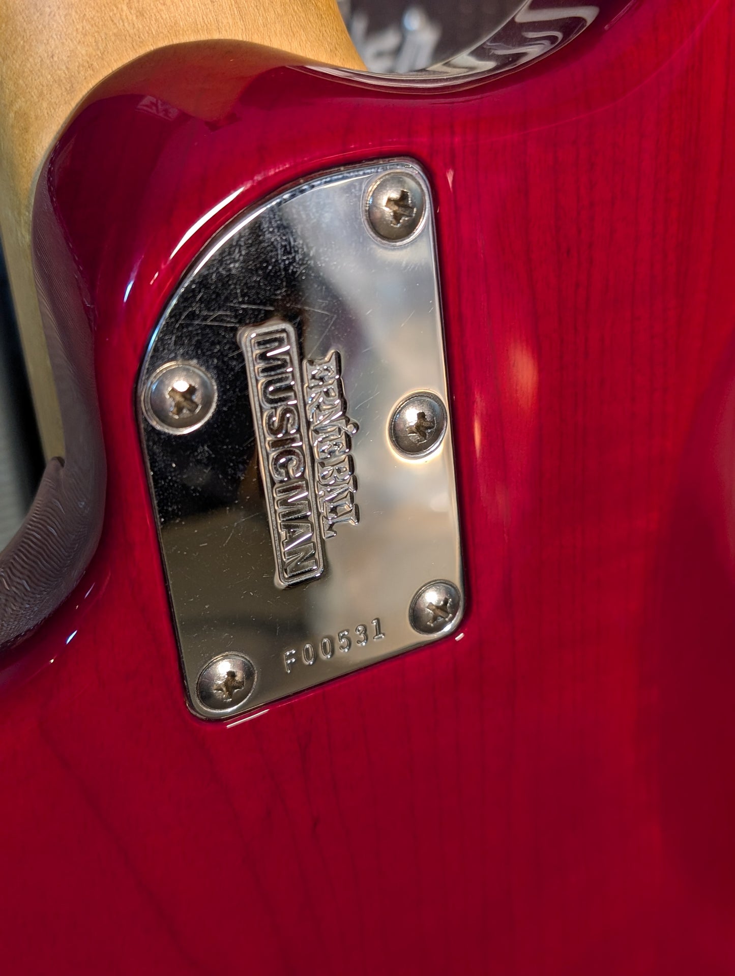 Ernie Ball Music Man Sterling 4-String Fretless Electric Bass Guitar w/Case - Translucent Red (1998)